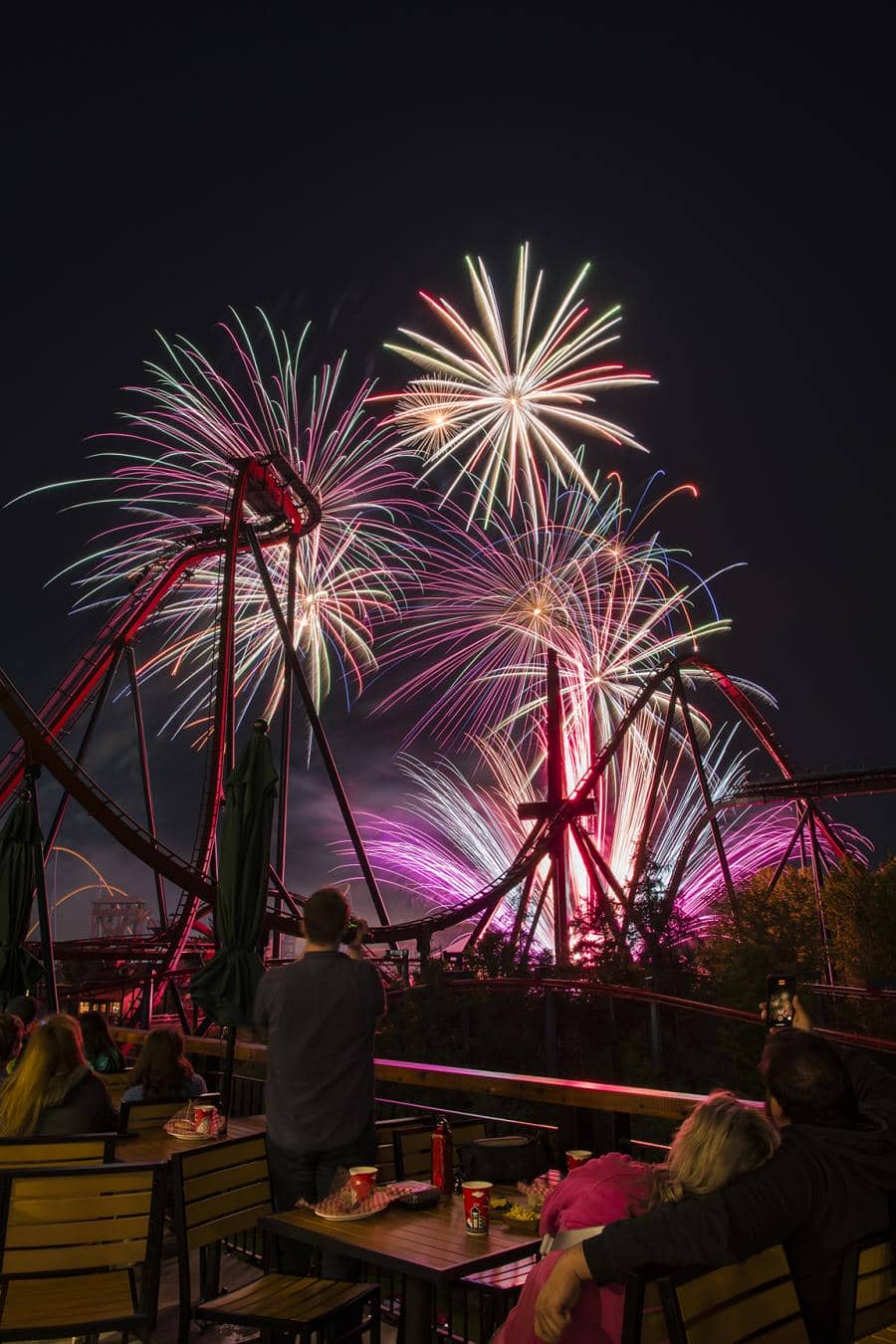 A family views Canada's Wonderland's Celebration Canada Fireworks